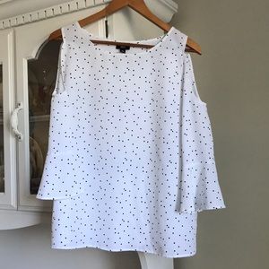 Polka dot blouse with cut out sleeves